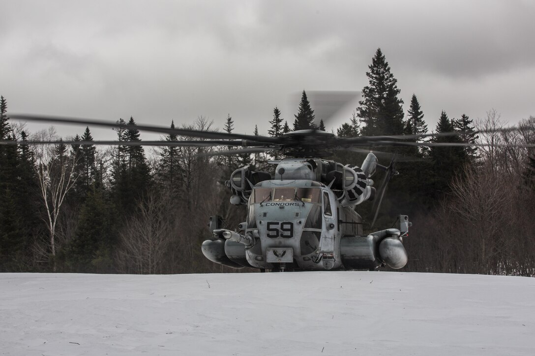 A CH-53E Super Stallion with Marine Heavy Helicopter Squadron 464 lands in snow during Exercise Frigid Condor near Brunswick, Maine, Jan. 22, 2017. HMH-464 conducted the exercise to increase the squadron’s operational readiness in extreme conditions. 