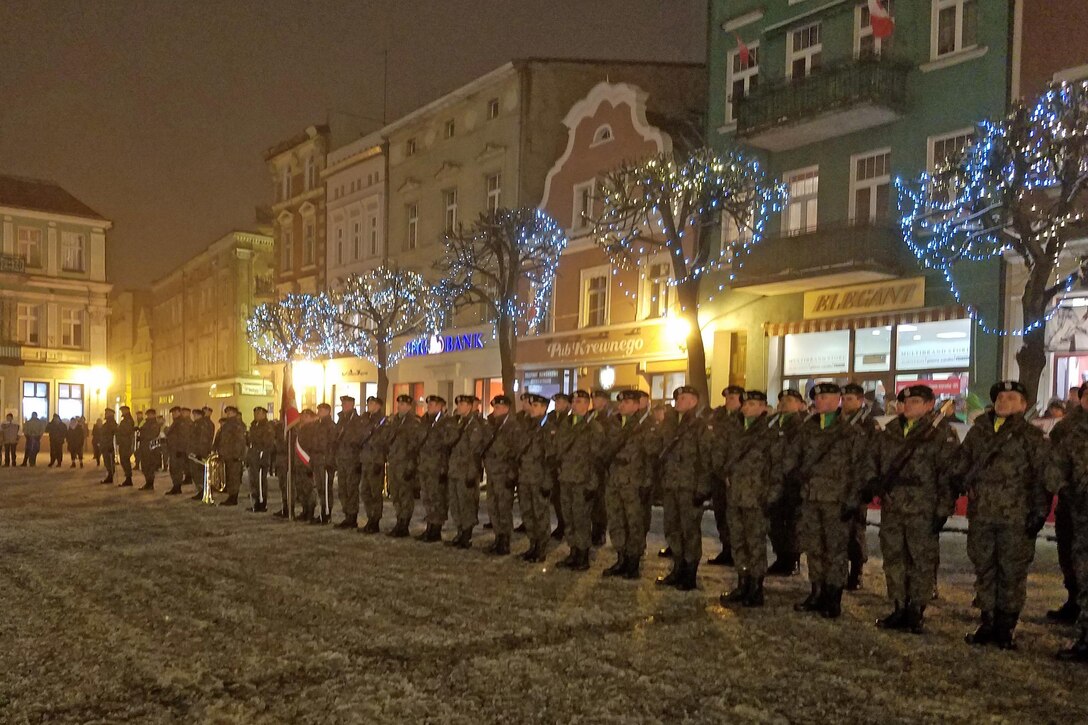 Polish soldiers stand in formation during a remembrance ceremony in Leszno, Poland, Jan. 17, 2017. The ceremony marked the 97th anniversary of the day when the German occupation of Poland ended following World War I. U.S. soldiers from the 3rd Armored Brigade, 4th Infantry Division were invited to attend the celebrations. Army photo by Staff Sgt. Corinna Baltos