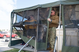 170123-YL073-105 (Jan. 23, 2017) MAYPORT, Fla. - Sailors from various commands erect a Mobile Kitchen Trailer (MKT) during Continuing Promise 2017 (CP-17) pre-deployment training at Naval Station Mayport, Fla. Continuing Promise 2017 is a U.S. Southern Command-sponsored and U.S. Naval Forces Southern Command/U.S. 4th Fleet-conducted deployment to conduct civil-military operations including humanitarian assistance, training engagements, and medical, dental, and veterinary support in an effort to show U.S. support and commitment to Central and South America. (U.S. Navy Photo by Mass Communication Specialist 2nd Class Shamira Purifoy)
