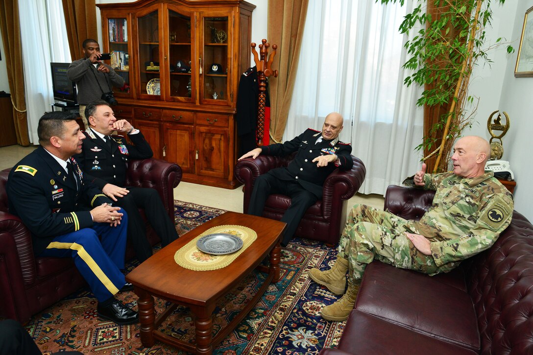Lt. Gen. Charles D. Luckey (right), Commanding General U.S. Army Reserve Command, Lt. Gen Vincenzo Coppola (center), Commanding General “Palidoro” Carabinieri Specialized and Mobile Units, Brig. Gen. Giovanni Pietro Barbano, Center of Excellence for Stability Police Units (CoESPU) director and U.S. Army Col. Darius S. Gallegos (left), CoESPU deputy director, talk during visit at Center of Excellence for Stability Police Units (CoESPU) Vicenza, Italy, January 20, 2017.(U.S. Army Photo by Visual Information Specialist Paolo Bovo/released)