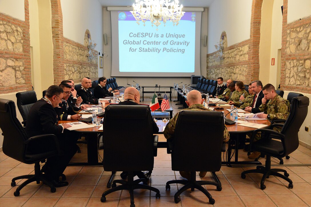 Carabinieri and U.S. staff, attend Center of Excellence for Stability Police Units (CoESPU) meeting, during visit at (CoESPU), of Lt. Gen. Charles D. Luckey, Commanding General U.S. Army Reserve Command , Vicenza, Italy, January 20, 2017. (U.S. Army Photo by Visual Information Specialist Paolo Bovo/released)