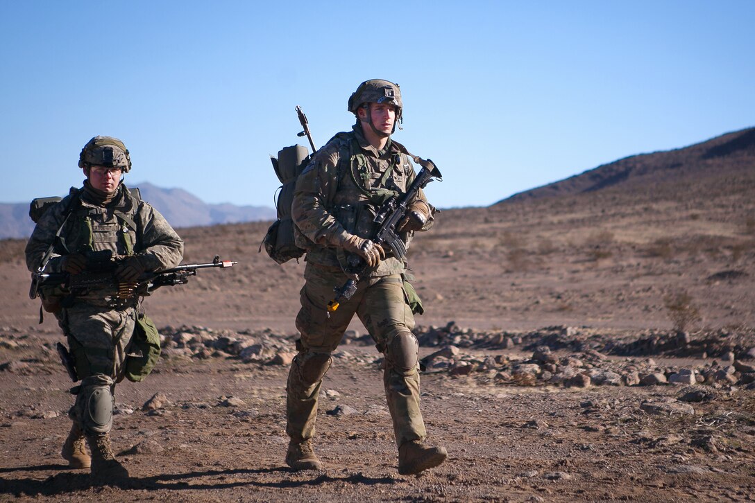Soldiers advance to their follow on fighting positions during training exercise 17-03 at the National Training Center, Fort Irwin, Ca., Jan. 16, 2017. Army photo by Sgt. Jason A. Young