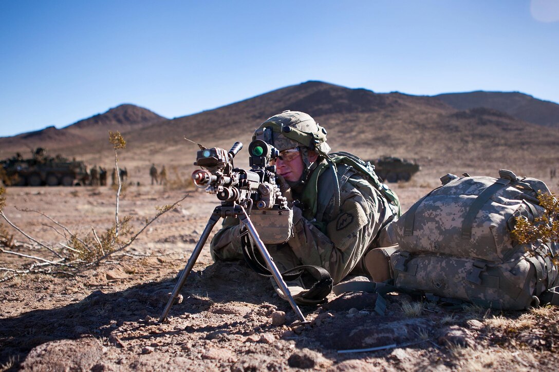 Army Pfc. Travis Williamson scans his sector while providing security during training exercise 17-03 at the National Training Center, Fort Irwin, Ca., Jan. 16, 2017. Williamson is assigned to the 25th Infantry Division’s Company B, 3rd Battalion, 21st Infantry Regiment, 1st Stryker Brigade Combat Team. Army photo by Sgt. Jason A. Young