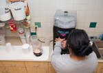 Jaimee Diaz, Force Fitness Bar day manager, blends a protein smoothie for a customer at Joint Base San Antonio-Randolph Jan. 20, 2017. The Institute of Medicine recommends adults 19 years of age and older get 10 percent to 35 percent of their daily calories from protein. (U.S. Air Force photo by Airman 1st Class Lauren Parsons/Released)
