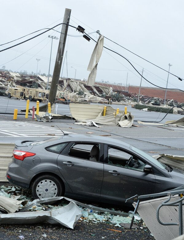 A building and several other structures on Marine Corps Logistics Base Albany lay in ruins following a tornado, Jan. 23, 2017. A line of strong thunderstorms produced a tornado that passed through the Albany, Georgia community and Marine Corps Logistics Base Albany carving a path of destruction leaving the landscape strewn with broken trees, downed power lines and damaged structures, Jan. 22, 2017.
