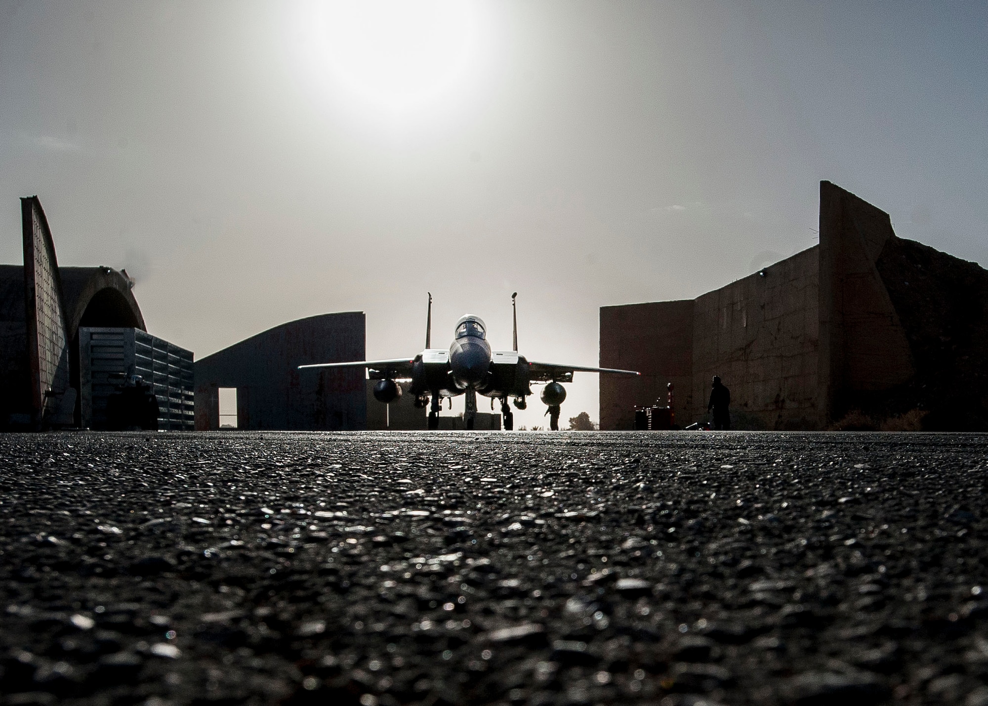 Crew chiefs prepare to launch a F-15E Strike Eagle, Jan. 9, 2017, in Southwest Asia. The jet is assigned to the Aircraft Maintenance Unit deployed from Mountain Home Air Force Base, Idaho. (U.S. Air Force photo by Staff Sgt. Eboni Reams)