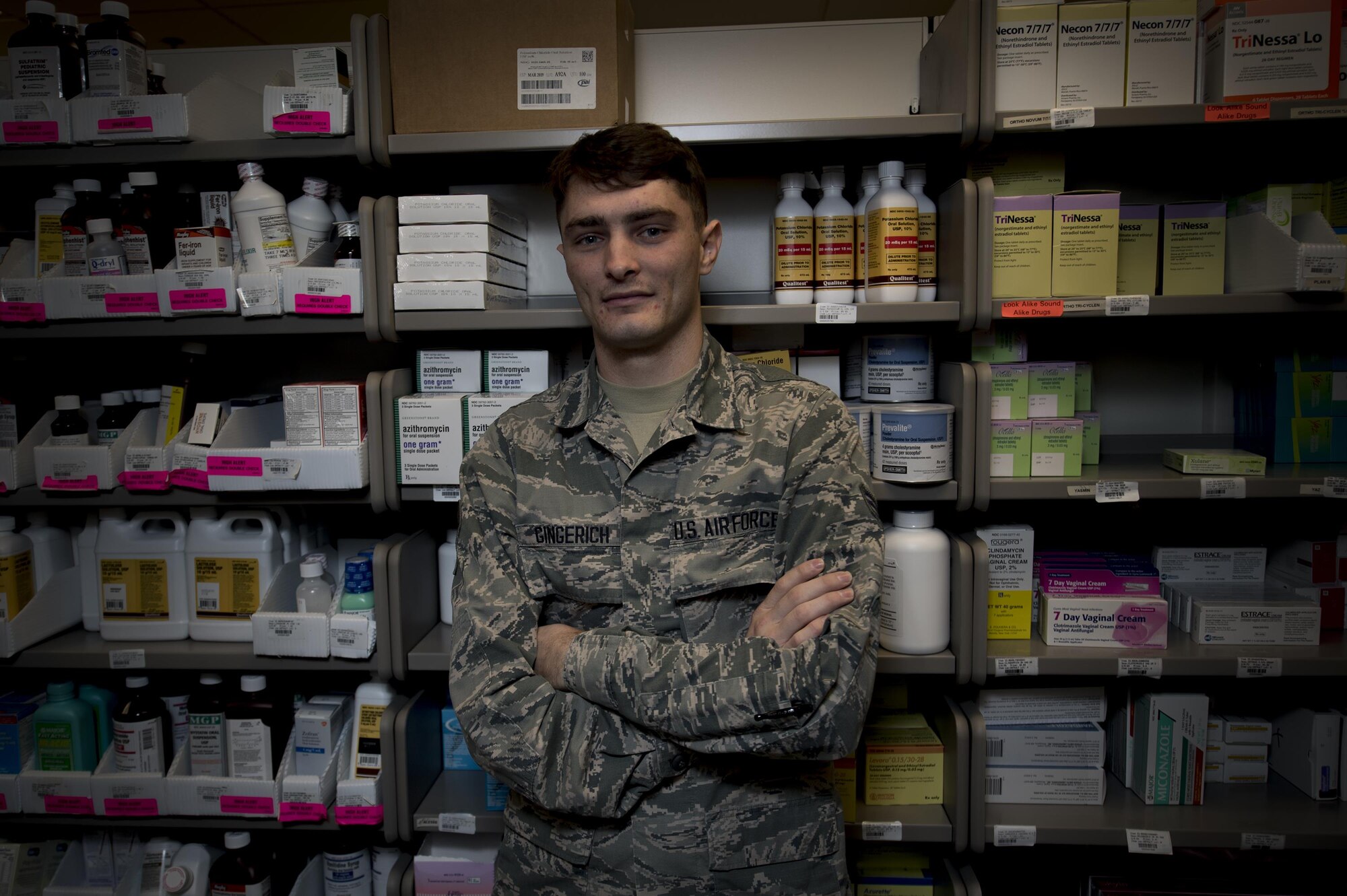 Senior Airman Christopher Gingerich, 23d Medical Support Squadron pharmacy technician poses for a photo with various medicines, Jan. 19, 2016, at Moody Air Force Base, Ga. Pharmacists ensure professional standards of prescription dispensing, patient medication counseling and drug regimen reviews. In the Air Force, there are currently 142 active duty, 20 Air Force reservist and seven Air National Guard pharmacists. (U.S. Air Force photo by Airman 1st Class Daniel Snider)