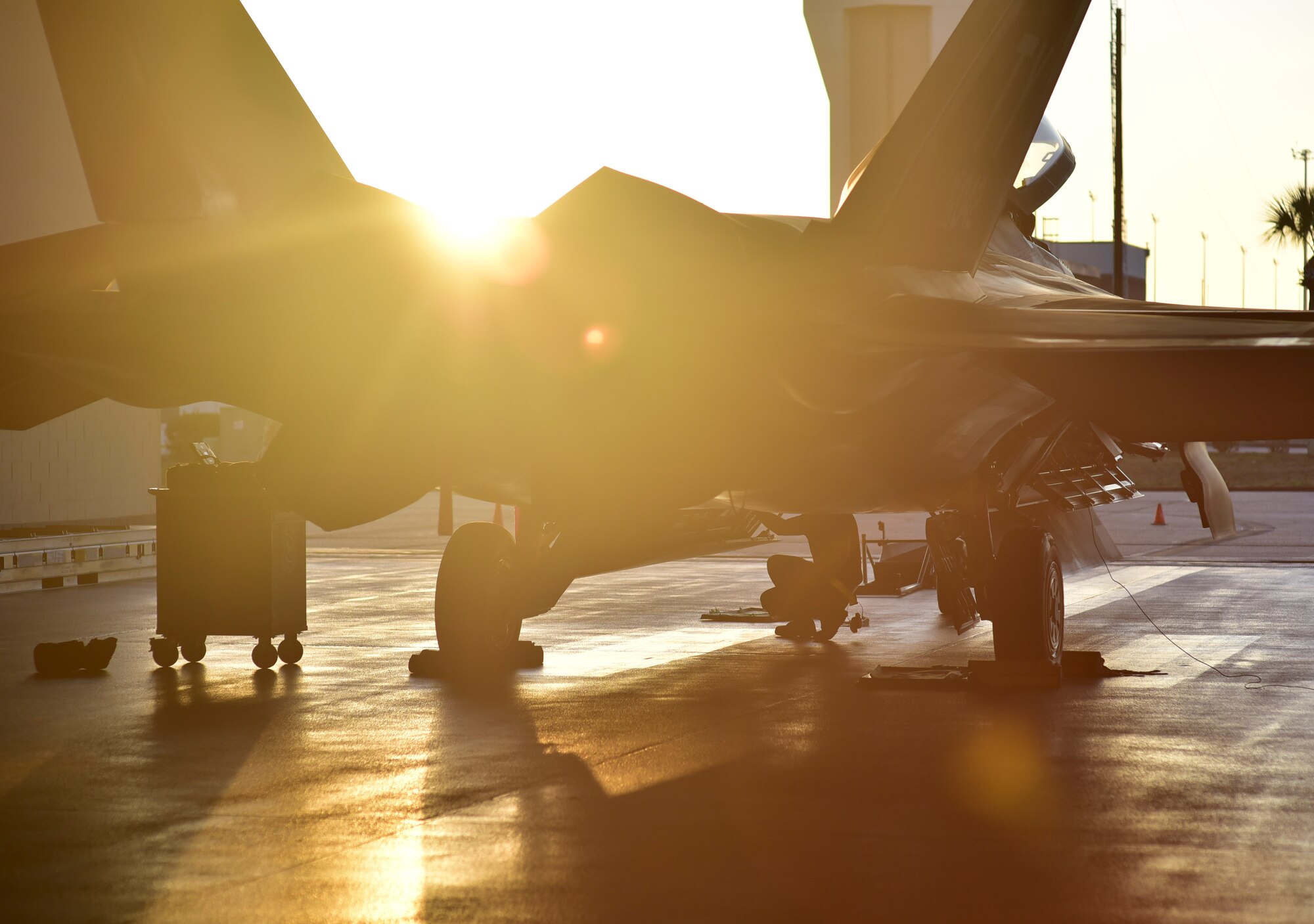 U.S. Air Force Senior Airman Michael B. Cheek, 43rd Aircraft Maintenance Unit armament systems technician, inspects the weapons bay of an F-22 Raptor during the Load Crew of the Year competition at Tyndall Air Force Base, Fla., Jan. 20, 2017. Airmen from the 43rd AMU and the 95th AMU were evaluated on dress and appearance, technical knowledge and a timed 90 minute weapons load. (U.S. Air Force photo by Tech. Sgt. Javier Cruz/Released)