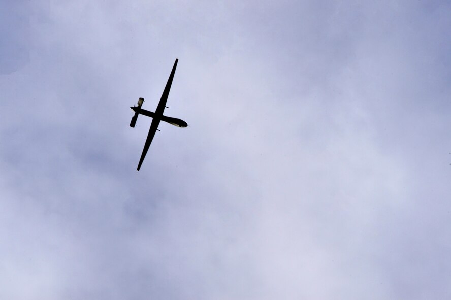 An MQ-1 Predator flies overhead during a training mission Dec. 12, 2016, at Creech Air Force Base, Nev. The MQ-1 and the MQ-9 Reaper, help operators provide unique and unmatched situational awareness on the battlefield due to their exceptionally long loiter times. The aircraft can stay in the air for approximately 23 hours attributing to their glider construction, lightweight composite builds and efficient engines. (U.S. Air Force photo by Senior Airman Christian Clausen)