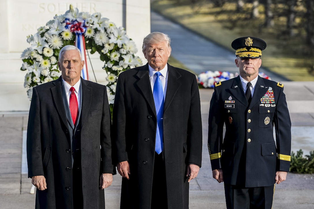 President-elect Donald J. Trump, center, Vice President-elect Michael R. Pence, left, and Army Maj. Gen. Bradley A. Becker, commanding general of Joint Task Force National Capital Region and the U.S. Army Military District of Washington, pause following a wreath-laying ceremony at the Tomb of the Unknown Soldier in Arlington National Cemetery, Va., Jan. 19, 2017. Army photo by Sgt. Alicia Brand