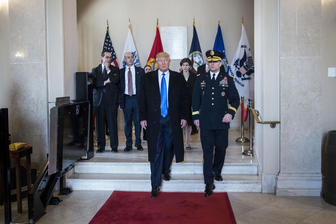 President-elect Donald J. Trump walks with Army Maj. Gen. Bradley A. Becker, commanding general of Joint Task Force National Capital Region and the U.S. Army Military District of Washington, in the Memorial Amphitheater display room at Arlington National Cemetery, Va., Jan. 19, 2017, before a wreath-laying ceremony. Trump and Vice President-elect Mike Pence placed a wreath at the Tomb of the Unknown Soldier as part of the inaugural events leading up to their swearing-in on Jan. 20. Army photo by Rachel Larue