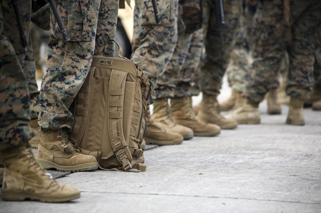 Marines await transportation during a Strategic Mobility Exercise aboard Marine Corps Air Station Cherry Point, N.C., Jan. 20, 2017. Marines assigned to Marine Air Support Squadron 1, Marine Air Control Group 28, 2nd Marine Aircraft Wing simulated troop movement in response to a limited/ no-notice mock deployment of a Direct Support Center with extensions in support of overseas contingency operations.  (U.S. Marine Corps photo by Sgt. N.W. Huertas/ Released) 