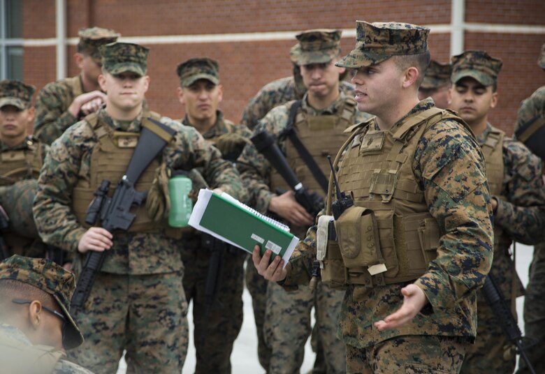 2nd Lt. Mackenzie Stewart briefs troops during a Strategic Mobility Exercise aboard Marine Corps Air Station Cherry Point, N.C., Jan. 20, 2017. Marines assigned to Marine Air Support Squadron 1, Marine Air Control Group 28, 2nd Marine Aircraft Wing simulated troop movement in response to a limited/ no-notice mock deployment of a Direct Support Center with extensions in support of overseas contingency operations. MASS-1 is responsible for the planning, receiving, coordination and processing of requests for direct or close air support. It provides this through the DASC, whether ground or airborne based.  Stewart is a basic air control/ anti-air warfare officer assigned to the squadron. (U.S. Marine Corps photo by Sgt. N.W. Huertas/ Released) 