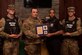 Police officers assigned to the 733rd Security Forces Squadron traffic section received three awards during a Traffic National Law Enforcement Challenge award presentation at Joint Base Langley-Eustis, Va., Jan. 12, 2017. The unit was awarded two state, first place awards in the categories of Military Police and Commercial Motor Vehicle Safety, and one national third place award in the Military Police category. (U.S. Air Force photo by Airman 1st Class Derek Seifert)