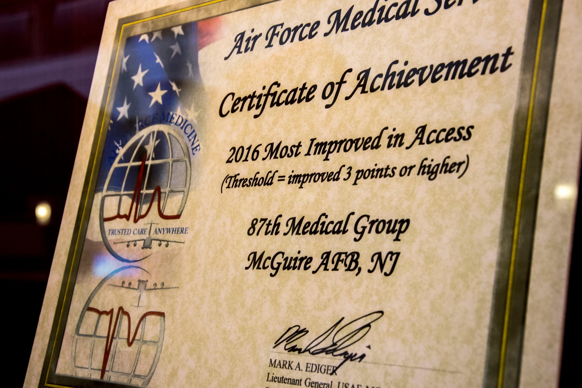 The award for most the 2016 AFMS “Most Improved Clinic” for Access to Care hangs in the atrium of the 87th Medical Group on Joint Base McGuire-Dix-Lakehurst, N.J., Jan. 24, 2016. The clinic received the award following a reform to Air Force Medical Home late last year, resulting in a decrease to the wait time for appointments and improvement to the continuity of care given to the approximate 17,000 enrolled patrons at JB MDL.