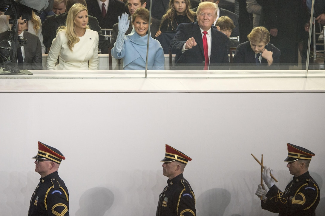 Members of the U.S. Army Band pass under the White House reviewing stand as President Donald J. Trump and members of his family watch the inaugural parade in Washington, D.C., Jan. 20, 2017. DoD photo by Navy Petty Officer 2nd Class Dominique A. Pineiro