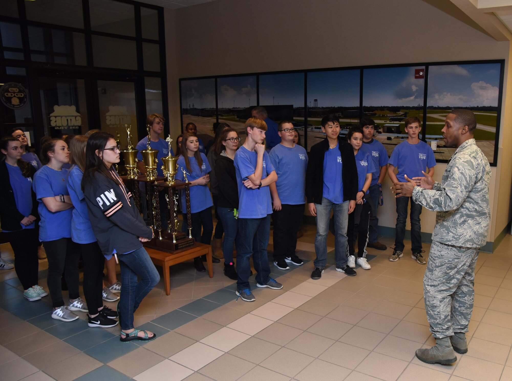 Capt. Edwin Pratt, 334th Training Squadron director of operations, welcomes local high school freshmen to Cody Hall during the Biloxi Chamber of Commerce Gulf Coast Junior Leadership Tour Jan. 24, 2017, on Keesler Air Force Base, Miss. The group’s objective is to produce students of outstanding character, while teaching them about community needs and what it takes to become a leader in today’s society. The visit included a 334th TRS air traffic control course overview, military training leader briefing and a dorm tour. (U.S. Air Force photo by Kemberly Groue)