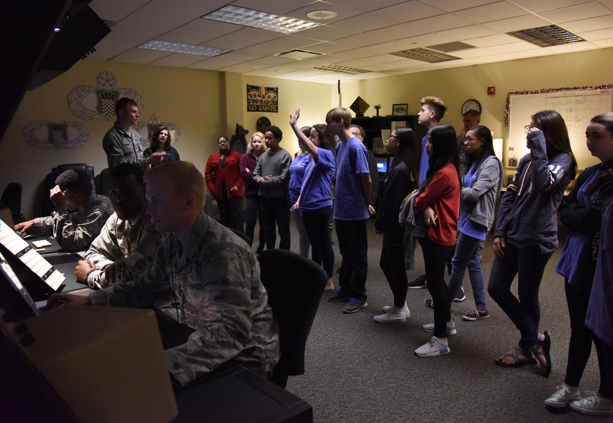 Staff Sgt. Benjamin Graham, 334th Training Squadron instructor, briefs local high school freshmen on the air traffic control course at Cody Hall during the Biloxi Chamber of Commerce Gulf Coast Junior Leadership Tour Jan. 24, 2017, on Keesler Air Force Base, Miss. The group’s objective is to produce students of outstanding character, while teaching them about community needs and what it takes to become a leader in today’s society. The visit also included a military training leader briefing and a dorm tour. (U.S. Air Force photo by Kemberly Groue)