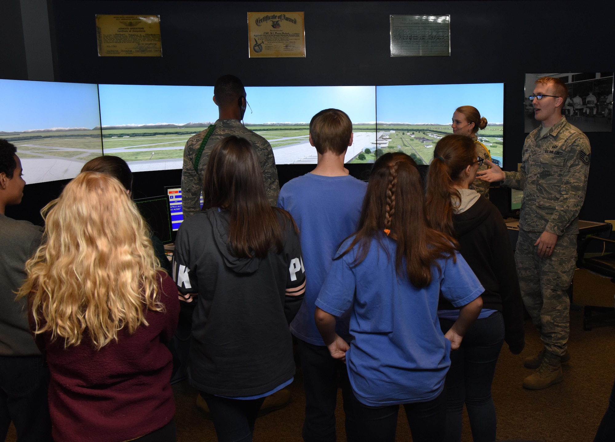 Tech. Sgt. William Olson, 334th Training Squadron instructor, briefs local high school freshmen on the air traffic control course at Cody Hall during the Biloxi Chamber of Commerce Gulf Coast Junior Leadership Tour Jan. 24, 2017, on Keesler Air Force Base, Miss. The group’s objective is to produce students of outstanding character, while teaching them about community needs and what it takes to become a leader in today’s society. The visit also included a military training leader briefing and a dorm tour. (U.S. Air Force photo by Kemberly Groue)