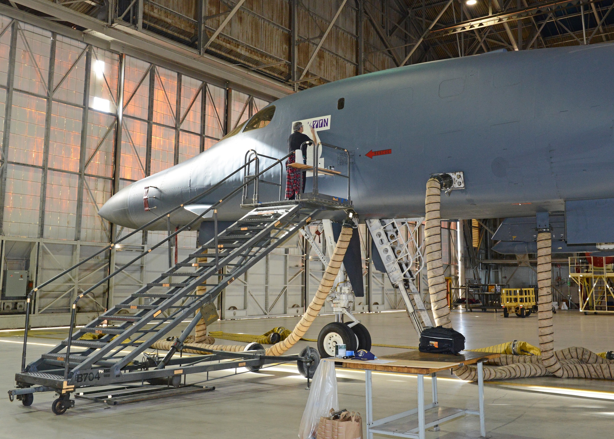 The B-1 Lancer was chosen to receive a Desert Junior-Senior High School logo as it is the favorite plane for the students when they visit the 419th Flight Test Squadron and 912th Aircraft Maintenance Unit for tours. (U.S. Air Force photo by Kenji Thuloweit)