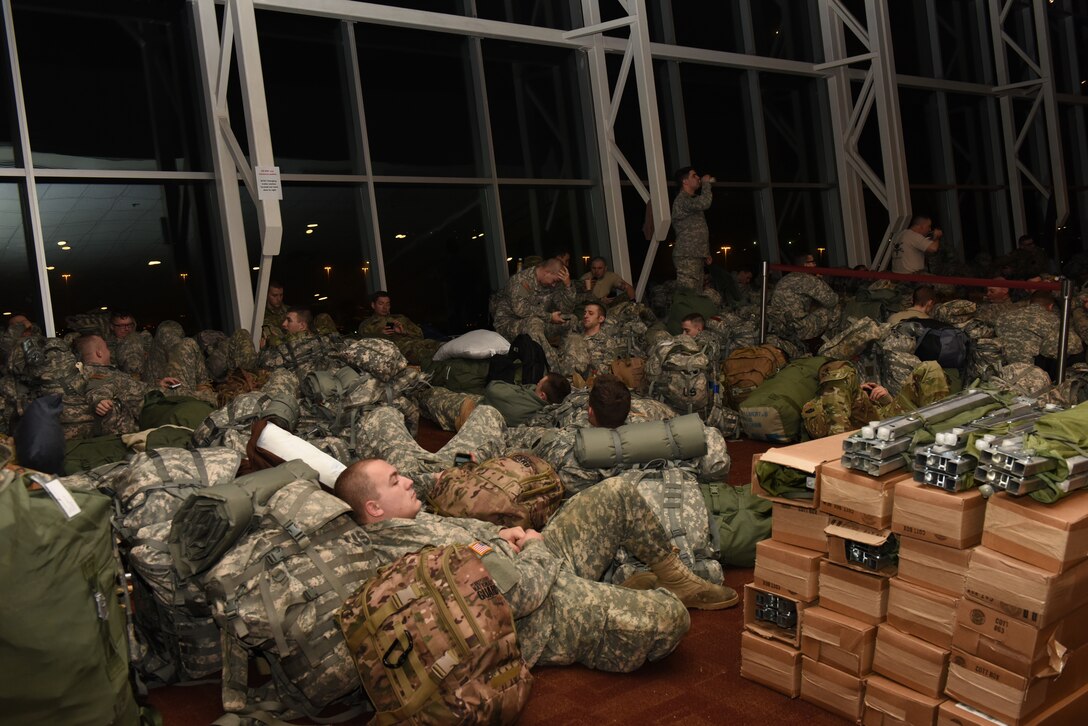 National Guardsmen prepare for departure Jan. 21, 2017, at FedEx Field in Washington, D.C., after performing their duties at the 58th Presidential Inauguration. More than 1,000 Soldiers and Airmen from the Commonwealth of Pennsylvania joined more than 7,000 troops from around the country, arriving at the nation's capitol to help support a safe, secure inauguration experience for the American public. (U.S. Air National Guard photo by 2nd Lt. Susan Penning/Released) 
