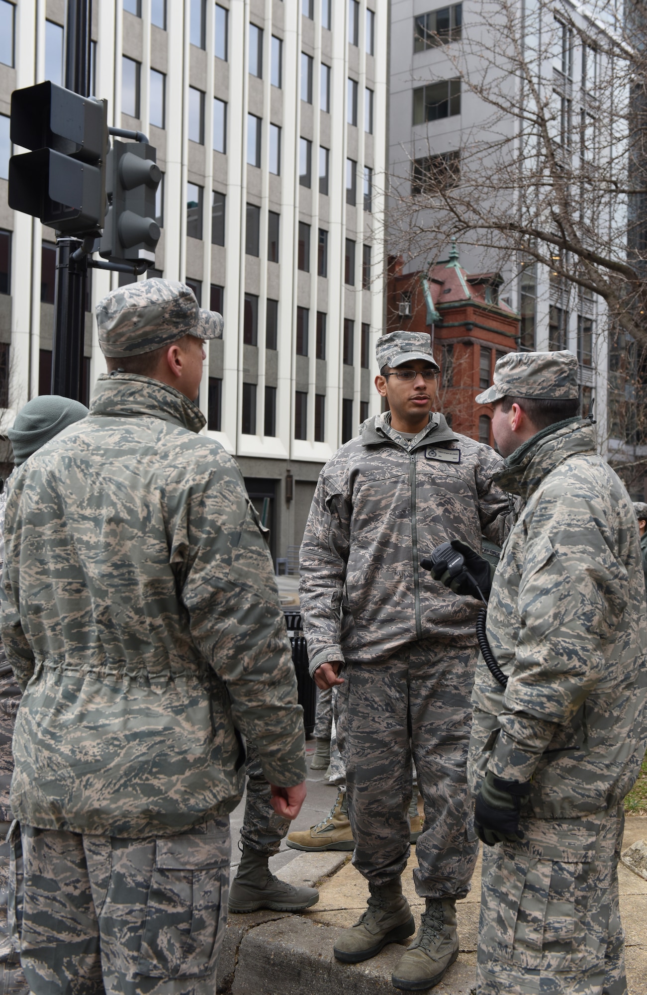 Pennsylvania Air National Guardsmen man a traffic control point on L Street in Washington, D.C., during the 58th Presidential Inauguration Jan. 20, 2017. More than 1,000 PANG Soldiers and Airmen headed to D.C. to support a safe and secure inauguration experience for the American public. They joined more than 7,000 Guardsmen from 44 states. (U.S. Air National Guard photo by 2nd Lt. Susan Penning/Released) 