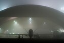 An RQ-4 Global Hawk awaits standard maintenance while a heavy fog rolls across the 380th Air Expeditionary Wing flightline at an undisclosed location in Southwest Asia, Jan. 12, 2017. Global Hawks have provided coalition partners with accurate intelligence necessary for precisely striking important Islamic State of Iraq and the Levant facilities and supply routes in support of Combined Joint Task Force-Operation Inherent Resolve. (Courtesy photo)