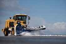 An Oshkosh snow plow clears snow on the flight line at Misawa Air Base, Japan, Jan. 5, 2017. During the winter, Misawa's 35th Civil Engineer Squadron snow shift shares responsibility of plowing all of Misawa AB including main base, north base and flight line areas. (U.S. Air Force photo by Airman 1st Class Sadie Colbert)