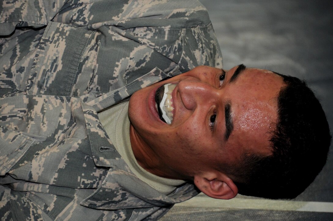 Senior Airman Dominic Rivera, 386th Expeditionary Maintenance Squadron craftsman, tests his fighting skills during an Army combatives tournament match January 22, 2017 at an undisclosed location in Southwest Asia. Rivera trained daily in the Brazilian jujitsu style with fellow deployed military personnel to prepare for the fight. (U.S. Air Force photo/Tech. Sgt. Kenneth McCann)