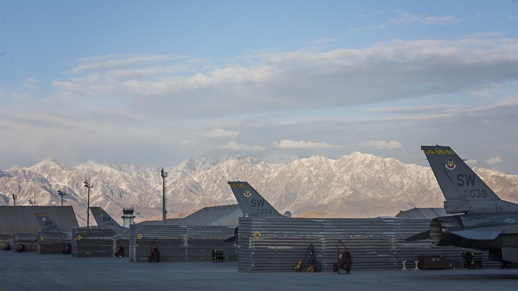 F-16 Fighting Falcons belonging to the 79th Expeditionary Fighter Squadron out of Shaw Air Force Base, South Carolina, sit on the ramp between missions at Bagram Airfield, Afghanistan, Jan. 6, 2017. The fighter squadron here flies multiple sorties daily to support the 455th Air Expeditionary Wing’s mission to defend, support and deliver airpower. (U.S. Air Force photo by Staff Sgt. Katherine Spessa)