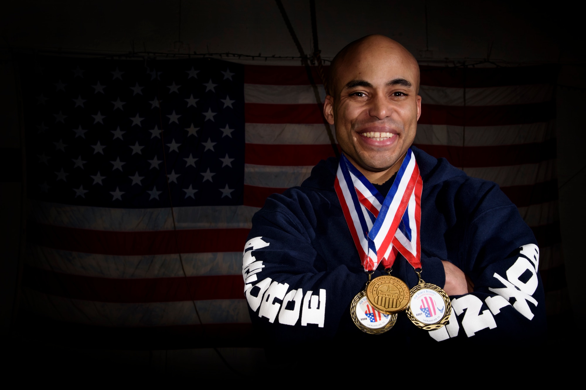 COLORADO SPRINGS, Colo. – Tech. Sgt. Rosey Summerville, 21st Force Support Squadron fitness NCO in charge and former Armed Forces Boxing Gold Medalist, keeps his legacy alive by training the next generation of boxers from Peterson Air Force Base and the local Colorado Springs community. Eight years into his military and boxing career, Summerville rose to the top of all U.S. military boxers and proclaimed not only his service, but himself as a champion. (U.S. Air Force photo by Airman 1st Class Dennis Hoffman)