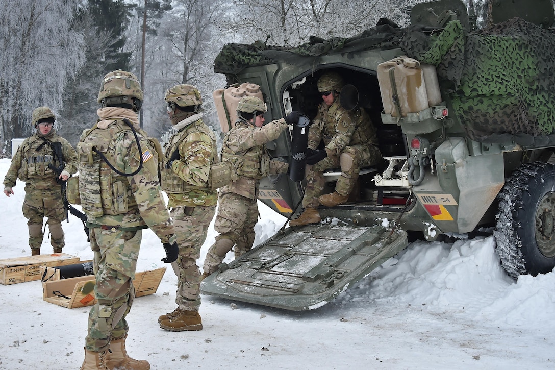 Soldiers prepare for a mortar live-fire exercise at the 7th Army Training Command’s Grafenwoehr Training Area in Germany, Jan. 24, 2017. The soldiers, assigned to Headquarters and Headquarters Troop, 1st Squadron, 2nd Cavalry Regiment, were training and preparing to support Operation Atlantic Resolve later in the year. Atlantic Resolve focuses on strengthening relationships among allied armies, improving interoperability, contributing to regional stability and demonstrating U.S. commitment to NATO. Army photo by Gertrud Zach