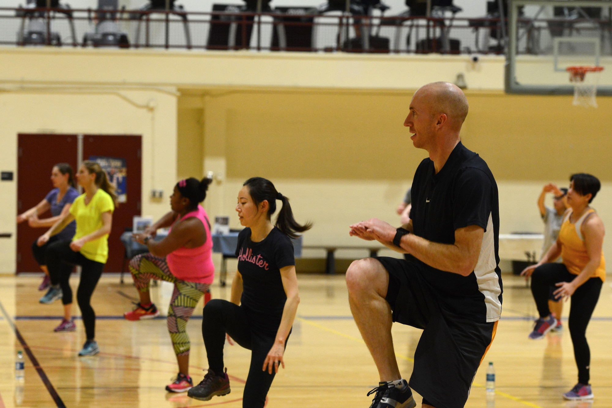 Participants exercise at the Strong by Zumba demo at the Elmendorf Fitness Center Fitness Expo at Joint Base Elmendorf-Richardson, Alaska, Jan. 14, 2017. Strong is a high-intensity interval training exercise that incorporates martial arts, cardio, balance and stability that is available for anyone 16 years or older with base access every Tuesday at 6:30 p.m. at the Buckner Physical Fitness Center and every Wednesday at 5 p.m. at the Elmendorf Fitness Center. 