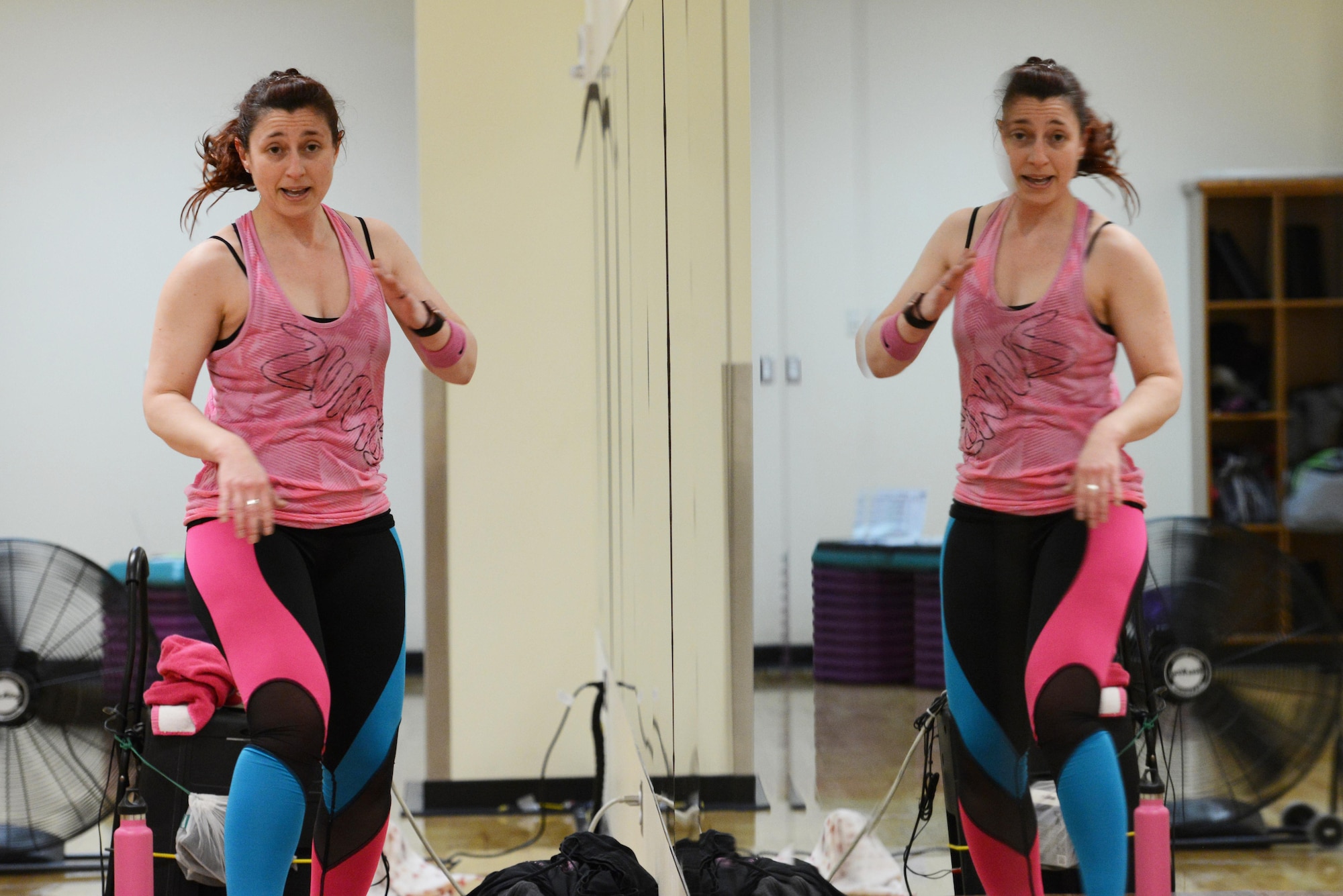 Jessica Pisano, Joint Base Elmendorf-Richardson Fitness lead group exercise instructor, leads a Zumba class at the Elmendorf Fitness Center at JBER, Alaska, Jan. 17, 2017. All group-exercise classes last approximately an hour and welcome participants of all skill levels who are 16 years older with base access. 