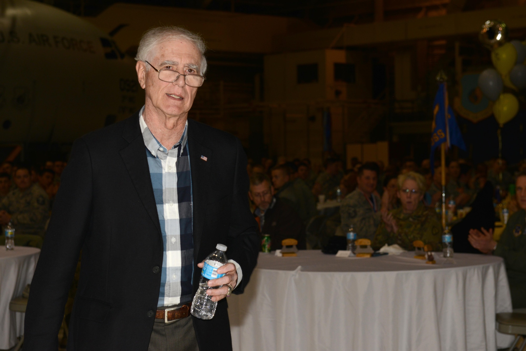 Donald W. Sheppard, a retired Air Force Major General, speaks at the 3rd Wing annual award ceremony in Hangar 1 at Joint Base Elmendorf-Richardson, Alaska, Jan. 20, 2017. Sheppard, a pilot with more than 5,000 flying hours, and 247 combat missions during the Vietnam War, spoke about his experiences in the Air Force and provided insight into how the military can keep improving. 