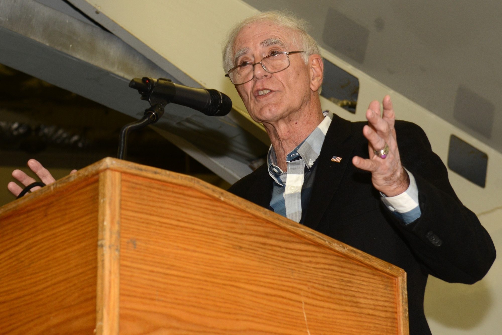 Donald W. Sheppard, a retired Air Force Major General, speaks at the 3rd Wing annual award ceremony in Hangar 1 at Joint Base Elmendorf-Richardson, Alaska, Jan. 20, 2017. Sheppard, a pilot with more than 5,000 flying hours, and 247 combat missions during the Vietnam War, spoke about his experiences in the Air Force and provided insight into how the military can keep improving.