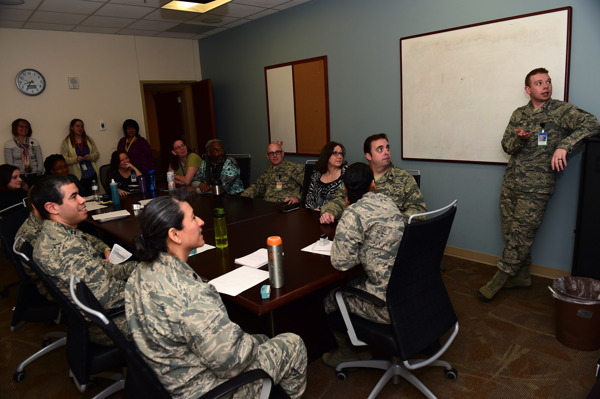 Staff Sgt. Christopher Durkin, 460th Medical Group Air Force Alcohol and Drug Abuse Prevention and Treatment NCO in charge, speaks to the 460th MDG mental health officers Jan. 24, 2017, at the Veterans Affairs Joint Venture Buckley Clinic in Aurora, Colo. Twice a week the mental health officers, many of which are part of the Biomedical Sciences Corps, come together to discuss patient care. (U.S. Air Force photo by Airman 1st Class Gabrielle Spradling/Released)