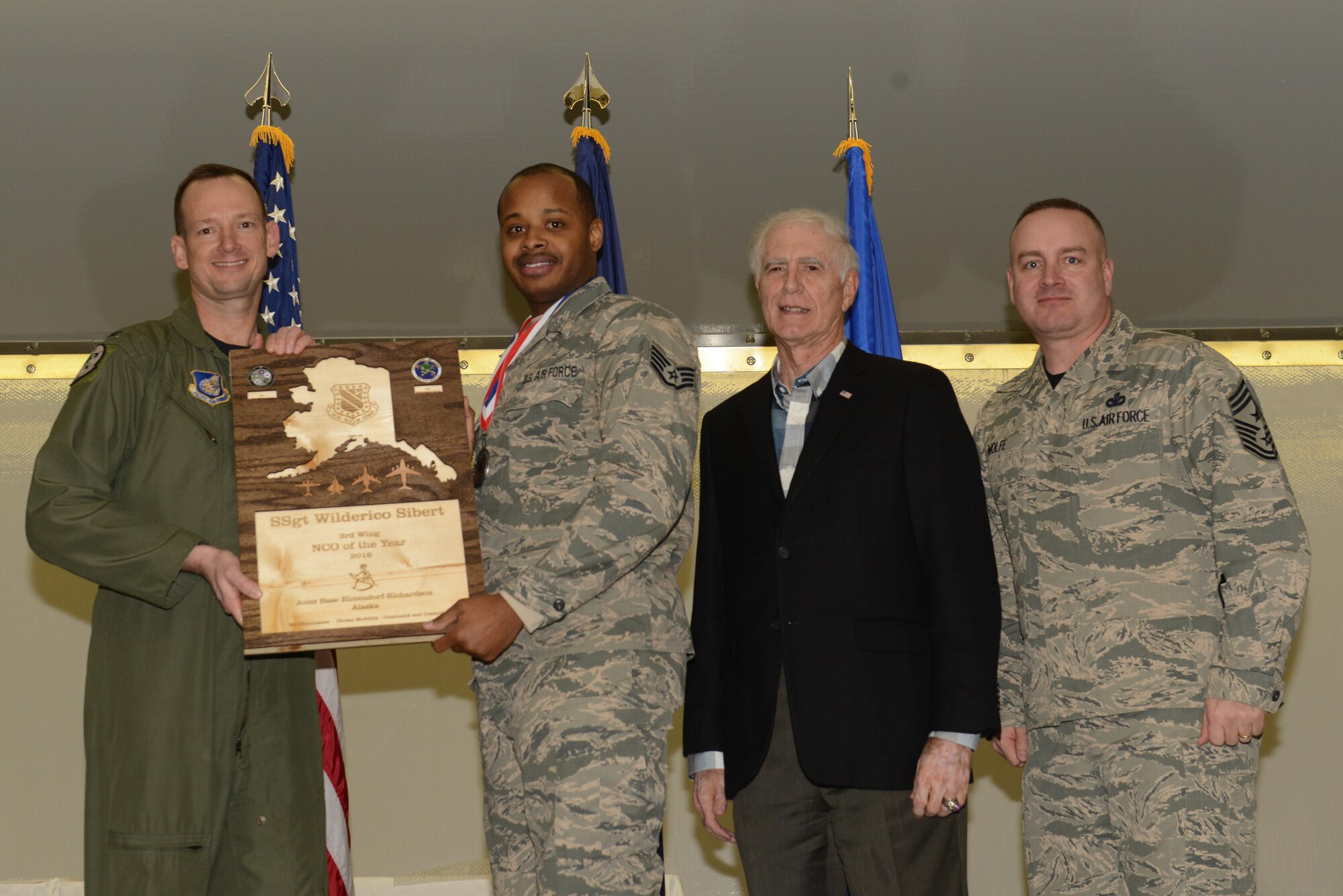 Air Force personnel assigned to the 3rd Wing are recognized during the Annual Awards Banquet hosted in Hangar 1 at Joint Base Elmendorf-Richardson, Alaska, Feb. 20, 2017. 