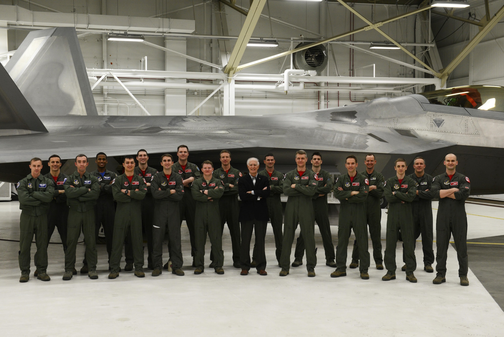 Donald W. Sheppard, a retired Air Force Major General (middle), visits the 90th Fighter Squadron at Joint Base Elmendorf-Richardson, Alaska, Jan. 20, 2017. Sheppard, a pilot with more than 5,000 flying hours, and 247 combat missions during the Vietnam War, spoke about his experiences in the Air Force and provided insight into how the military can keep improving.