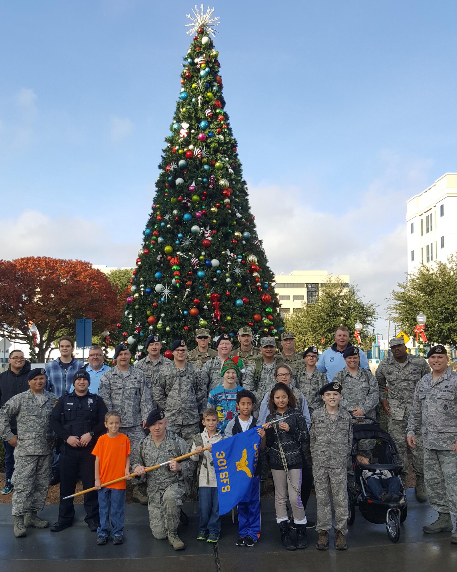 Security Forces service members, their families and unit retirees participating in the 2016 Ruck for Kids event pose for a group photo Dec. 17 at Cook Children's Medical Center in Fort Worth, Texas. The ruck, led by the 301st Security Forces Squadron, delivers donated toys to the hospital for distribution to patients throughout the year. (Courtesy photo)