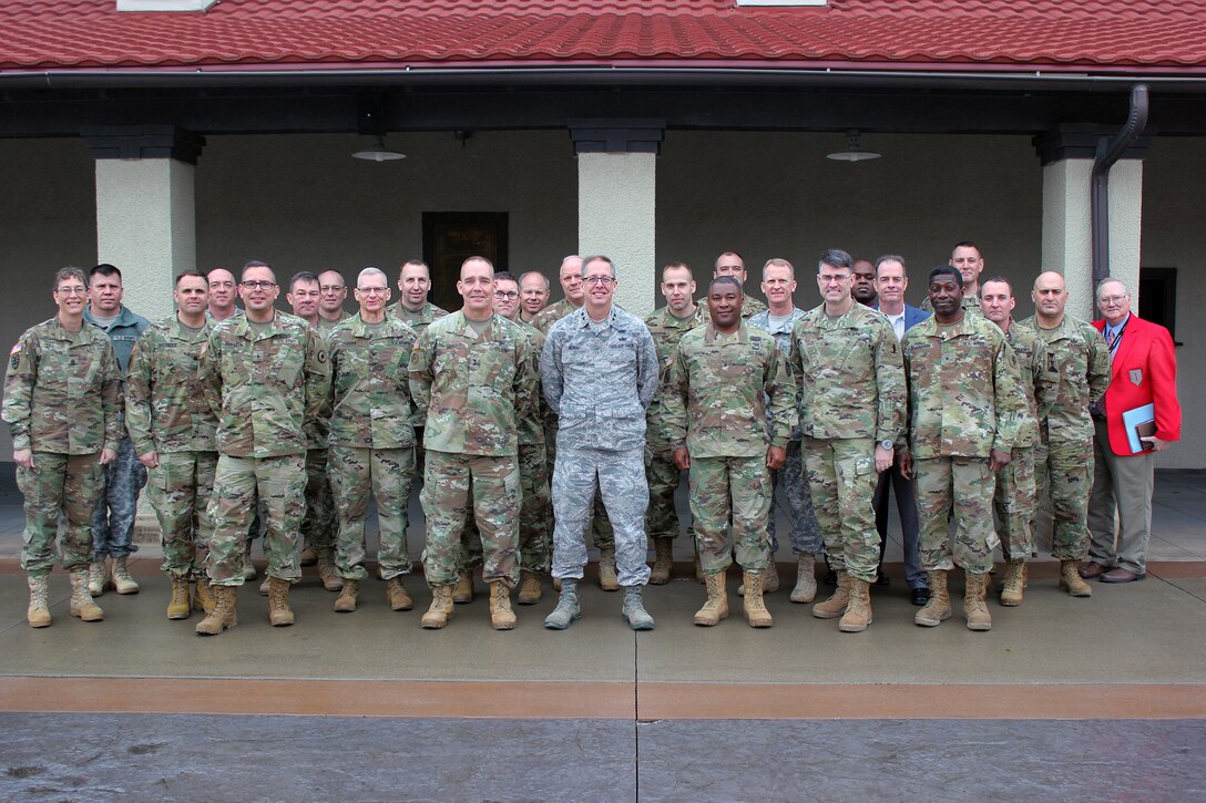 Approximately 30 members of the U.S. Army’s Total Force – Active Duty, U.S. Army Reserve, and National Guard – pose for a picture, after meeting Jan. 18-19, at the Iowa National Guard’s Camp Dodge Joint Maneuver Training Center in Johnston, Iowa, to take part in a Regional Total Army Conference. Officials discussed current issues and how they can help synchronize training efforts to produce stronger, better-trained Soldiers. Participants included Arkansas, Iowa, Kansas, Missouri, Nebraska, and Oklahoma National Guard officials, as well as representatives from U.S. Army Reserve units and Active Duty Army officials from the First Army Division West, headquartered at Fort Hood, Texas, and the “Big Red One,” the 1st Infantry Division, headquartered at Fort Riley, Kan.
