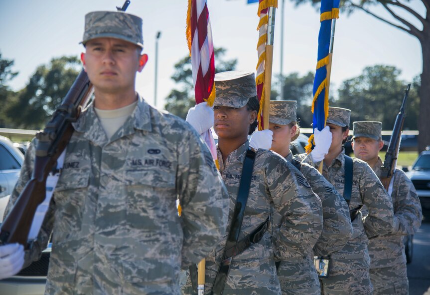 The Eglin honor guard waits for Military Working Dog Kanjer’s retirement ceremony to begin in front of the Air Force Armament Museum January 23.  The 96th Security Forces Squadron specifically requested for the base honor guard Airmen to be in ABU’s. (U.S. Air Force photo/Cheryl Sawyers)