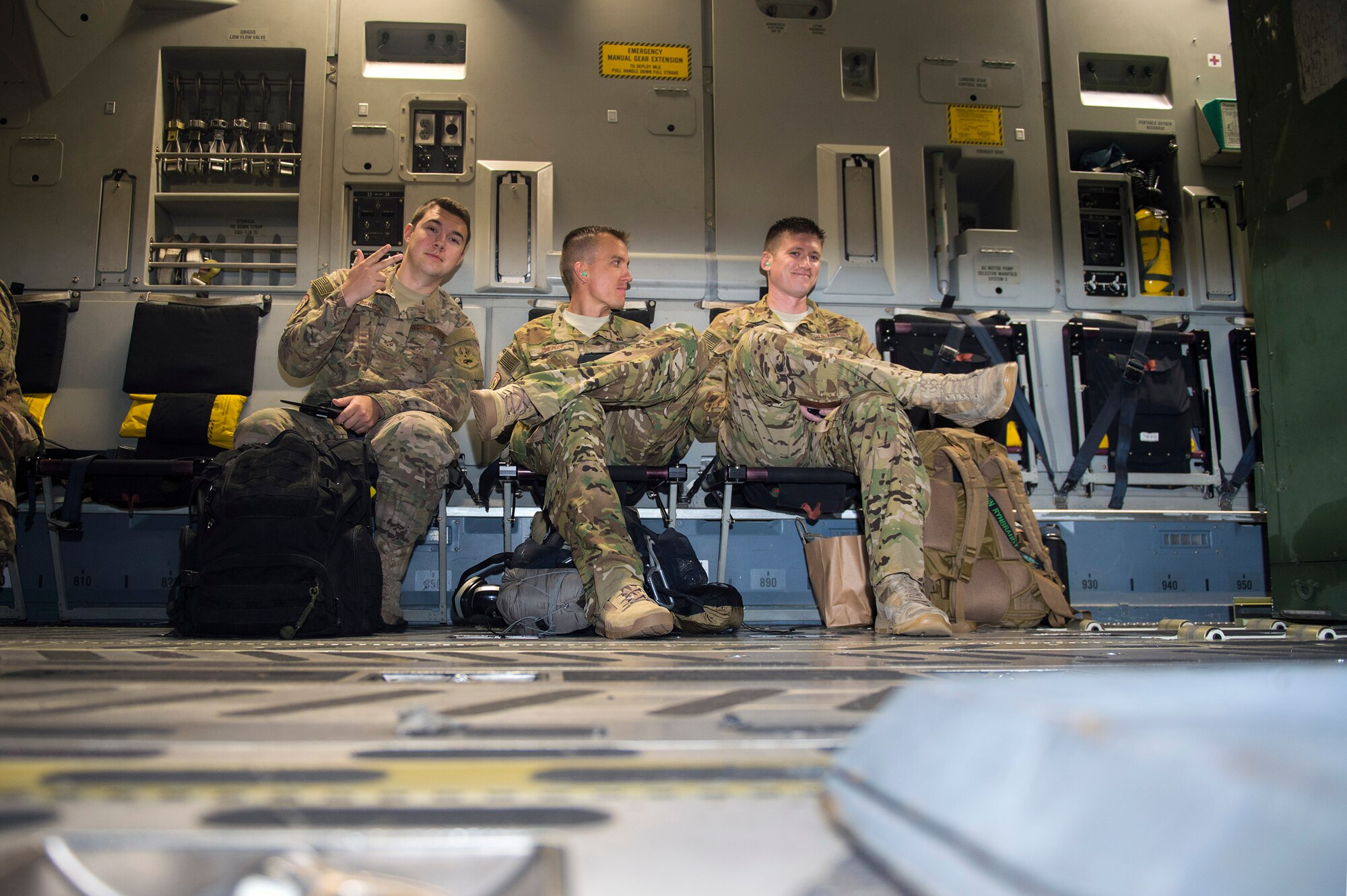 Moody Airmen from the 41st Rescue Squadron pose for a photo on a C-17 Globemaster III before departing for a deployment to Southeast Europe, Jan. 19, 2017, at Moody Air Force Base, Ga. The 41st RQS deployed to Southeast Europe to provide support for rescue missions. (U.S. Air Force photo by Airman 1st Class Greg Nash)