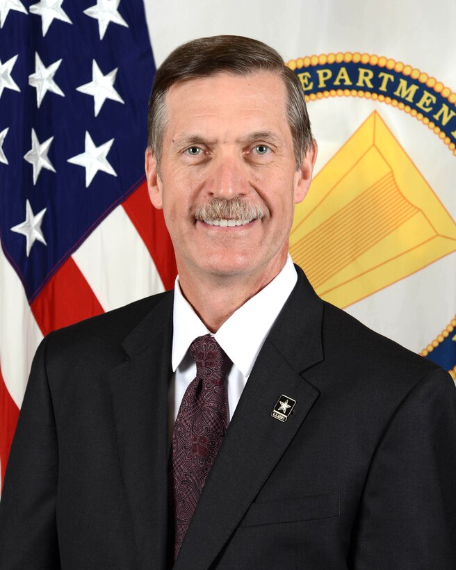 Karl F. Schneider, Principal Deputy Assistant Secretary, Office of the Assistant Secretary of the Army (Manpower & Reserve Affairs), poses for his official portrait in the Army portrait studio at the Pentagon in Arlington, Virginia, Dec. 02, 2015.  (U.S. Army photo by Sgt. Brand, Alicia/Released)