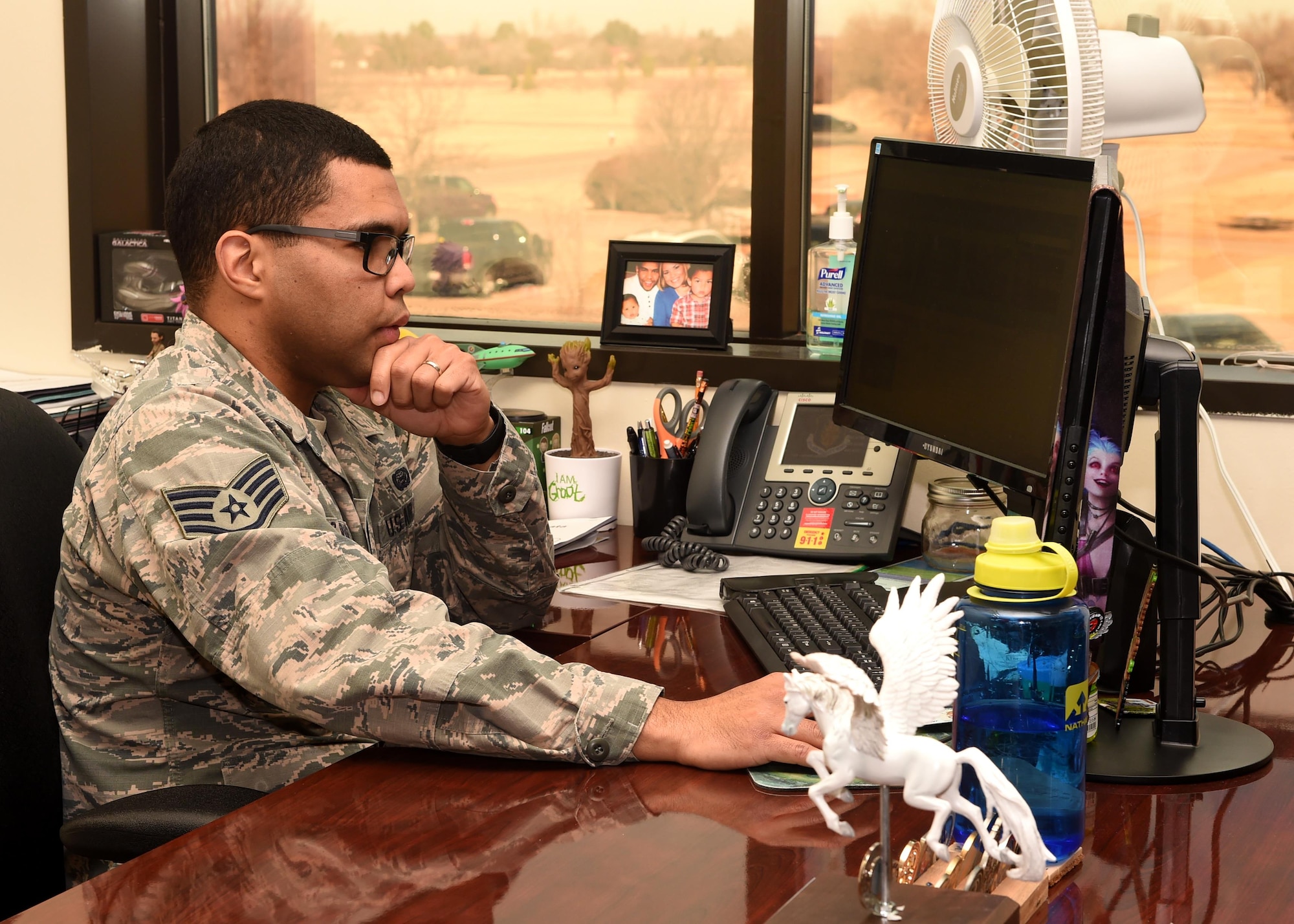 U.S. Staff Sgt. Henin D. Rios Arauz, 97th Force Support Squadron Force Management Office technician creates a Single Unit Retrieval Format for an Airman at Altus Air Force Base, Oklahoma January 23, 2017. The Force Management Office is a one stop shop that ensures Airmen have accurate and up to date information essential to their success and career progression. (U.S. Air Force photo by Senior Airman Megan E. Myhre/Released)