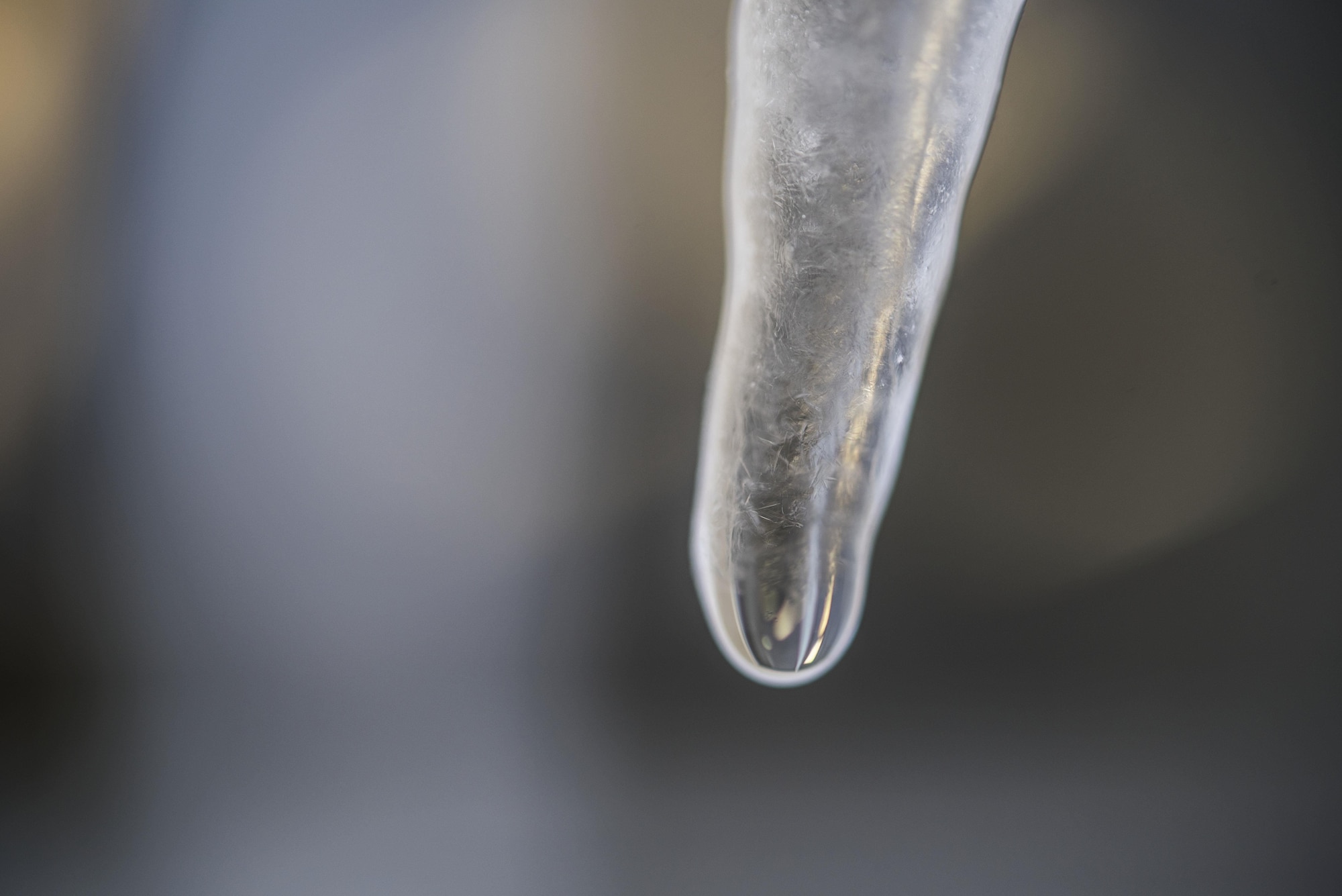 An icicle hangs from a U.S. Air Force facility at Misawa Air Base, Japan, Jan. 12, 2017. Facility managers can acquire an icicle remover from the 35th Civil Engineer Squadron U-Fix-It shop, which has a long extension allowing personnel to reach the top of the building and pull the icicles down from a safe distance. (U.S. Air Force photo by Airman 1st Class Sadie Colbert)