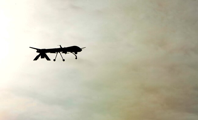 An MQ-1 Predator flies a training mission Dec. 12, 2016, at Creech Air Force Base, Nev. An MQ-1 aircrew destroyed a vehicle-borne improvised explosive device heading toward approximately 850 friendlies. (U.S. Air Force photo by Senior Airman Christian Clausen)