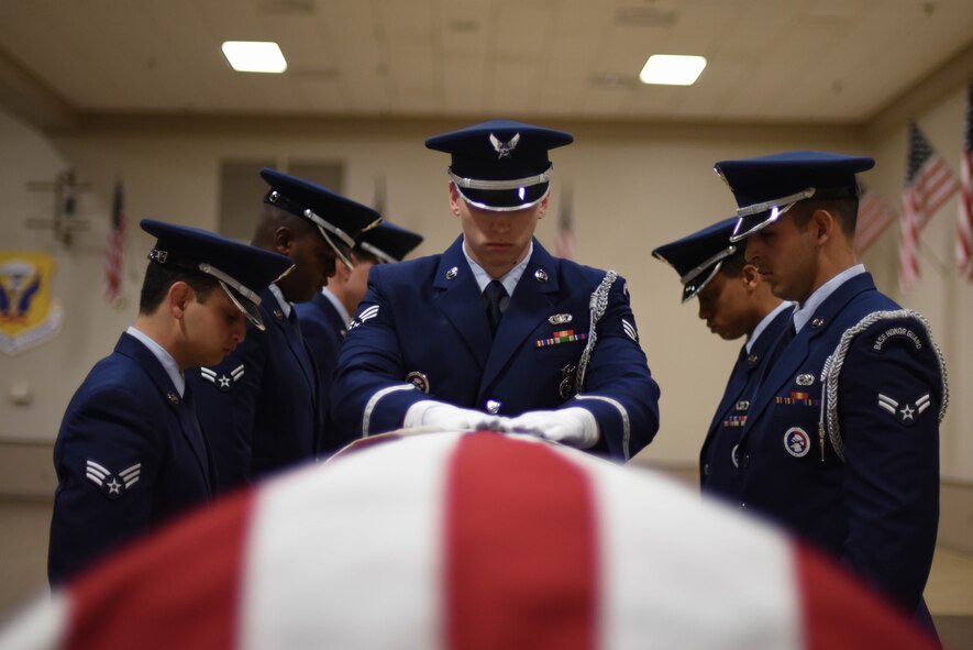 An honor guard graduating class demonstrates how they would conduct a military funeral at Barksdale Air Force Base, La., Jan. 23, 2017. The base honor guard is Barksdale’s ceremonial unit. (U.S. Air Force photo/Airman 1st Class Stuart Bright)