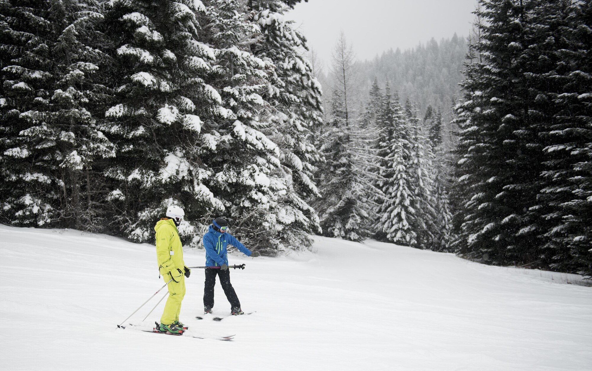 Neal Mader, 92nd Force Support Squadron Outdoor Recreation program guide, and Senior Airman Tyler Connell, 92nd Aircraft Maintenance Squadron crew chief, share skiing stories during an Outdoor Recreation trip Dec. 18, 2016, at 49 Degrees North Ski Resort, Wash. Outdoor Recreation is in the business of “making people’s vacations,” but it is also in the business of helping people with resilience, social interaction and experiencing the local area’s great outdoors. (U.S. Air Force photo/Airman 1st Class Sean Campbell)