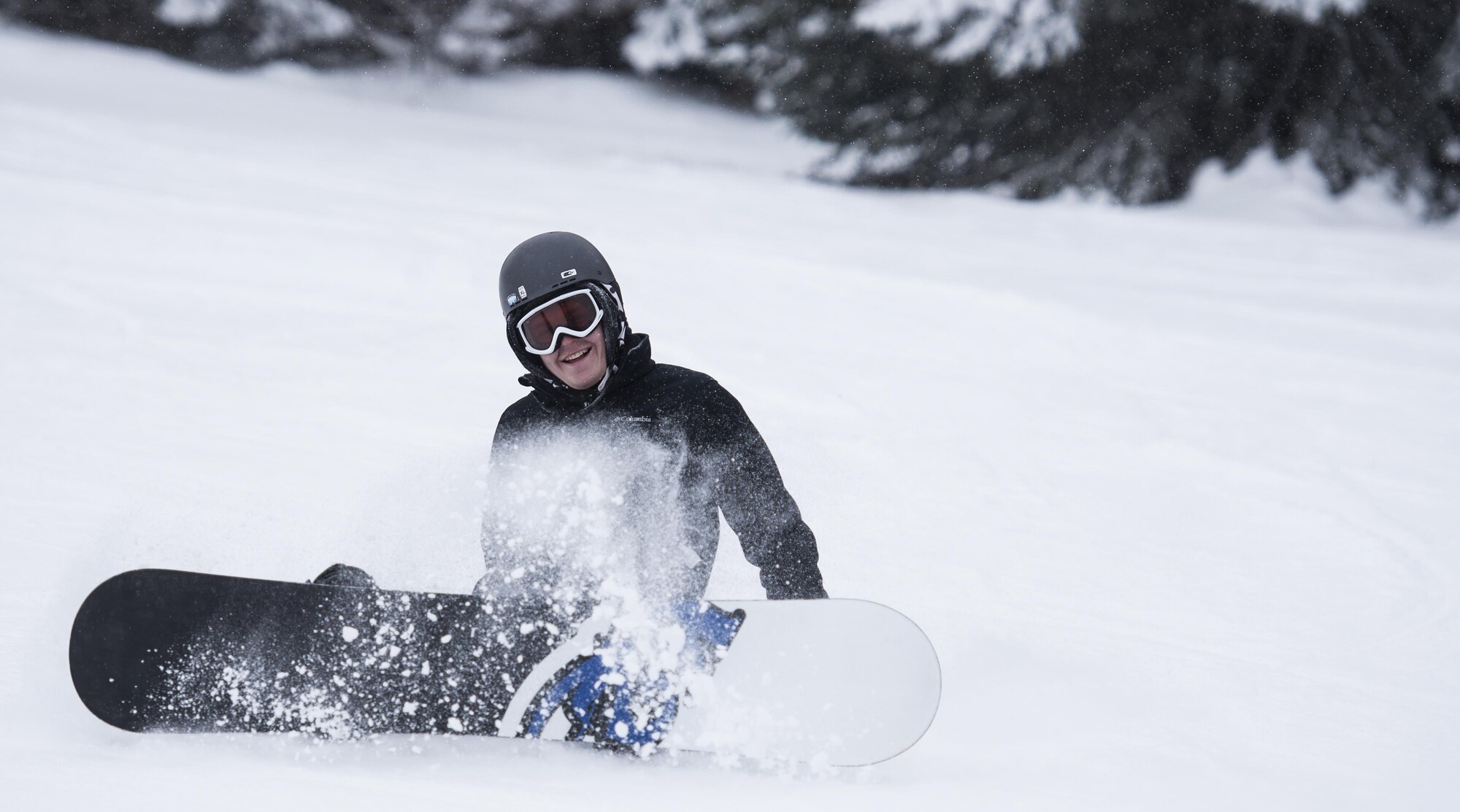 Airman 1st Class Josh Allison, 92nd Maintenance Squadron hydraulics journeyman, recovers from wiping out on his board during an Outdoor Recreation trip Dec. 18, 2016, at 49 Degrees North Ski Resort, Wash. Prior to the Outdoor Recreation program, there were numerous returning deployers who were unable to deescalate high-emotional tension and in turn faced many issues with suicide and depression. (U.S. Air Force photo/Airman 1st Class Sean Campbell)
